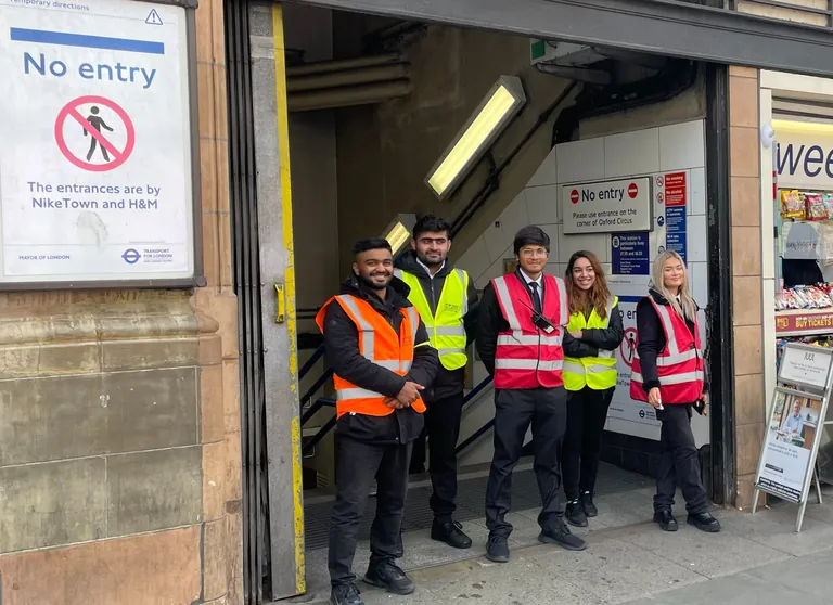 Five members of the deployment team at an Oxford Circus Underground entrance.