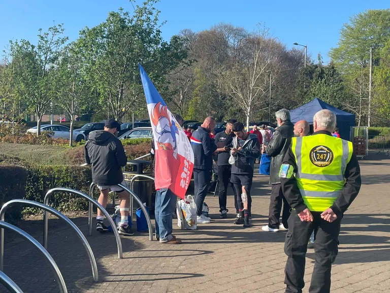 Security officer near the Union Cup 2023 event entrance.