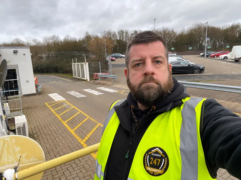Anthony Johnson wearing Guards 247 hi-vis at the Walsgrave site entrance.